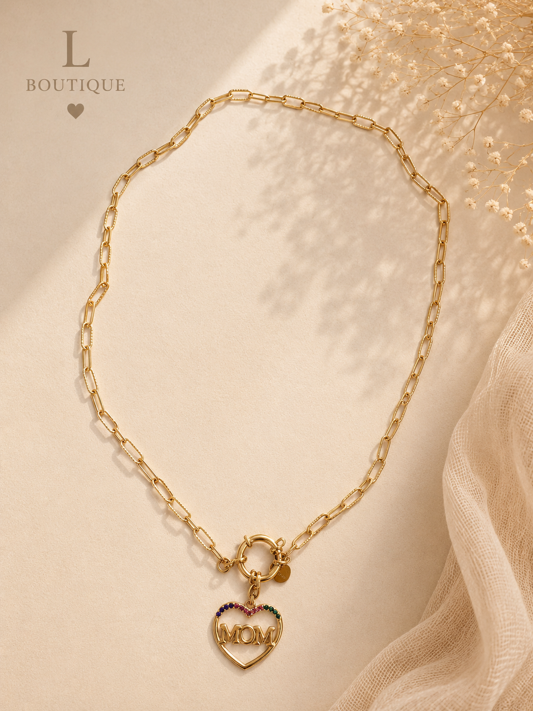 Gouden schakelketting met MOM hartjes-bedel — L Boutique